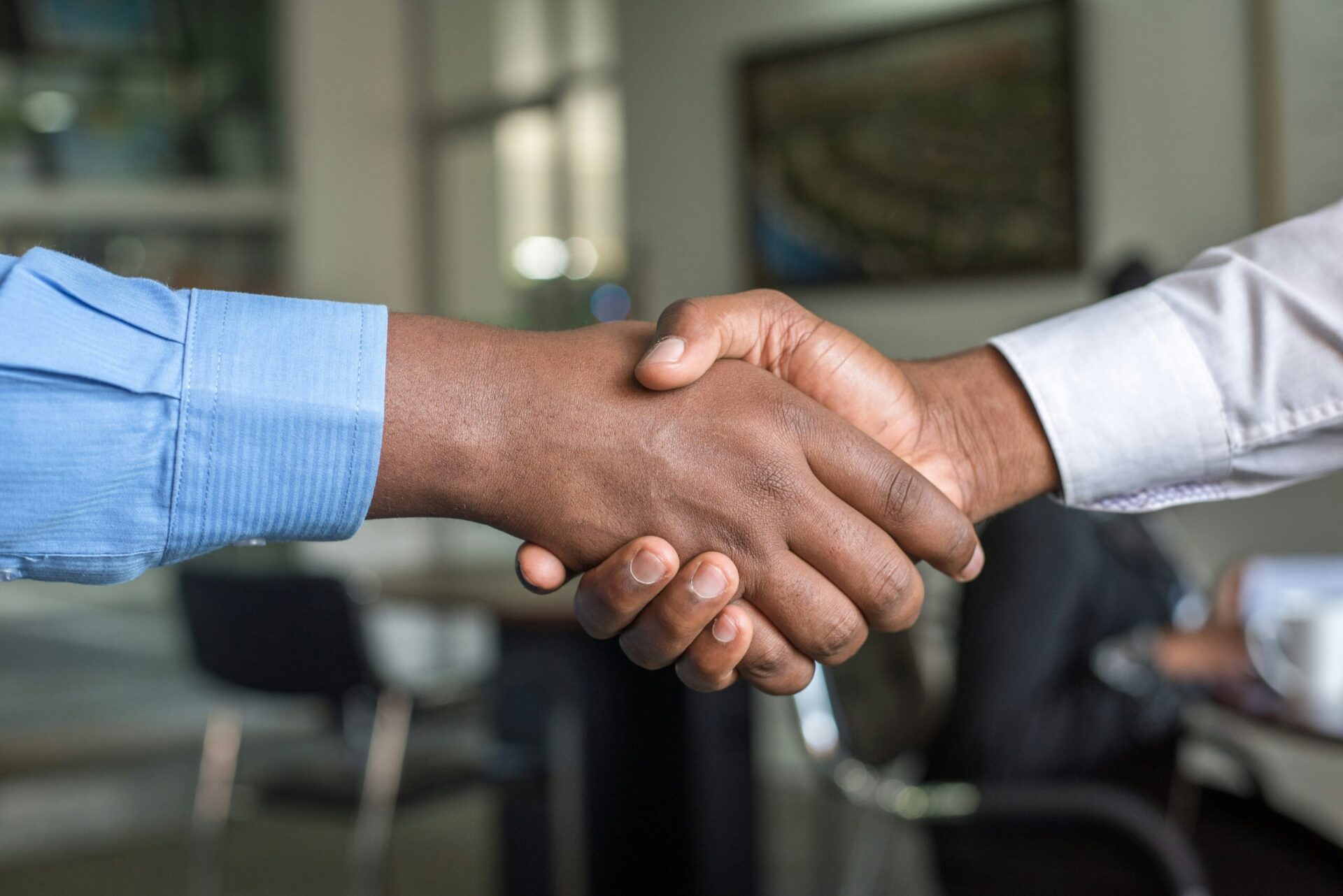 A person getting promoted after meeting their professional development goals